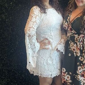 Elegant White Lace Dress With Bell Sleaves